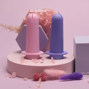 Menstrual cup applicator with silicone enhancer